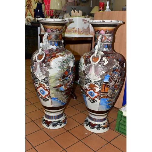 452 - A PAIR OF LARGE FLOORSTANDING BALUSTER SHAPED SATSUMA VASES, polychrome enamel decoration depicting ... 