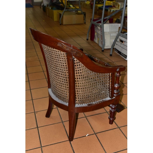 454 - A LATE 19TH CENTURY MAHOGANY CHILDS ARM CHAIR, with Bergere seat and back, removable foot rest, (con... 