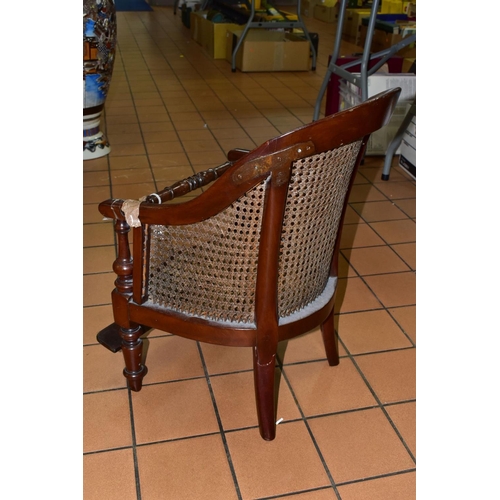 454 - A LATE 19TH CENTURY MAHOGANY CHILDS ARM CHAIR, with Bergere seat and back, removable foot rest, (con... 