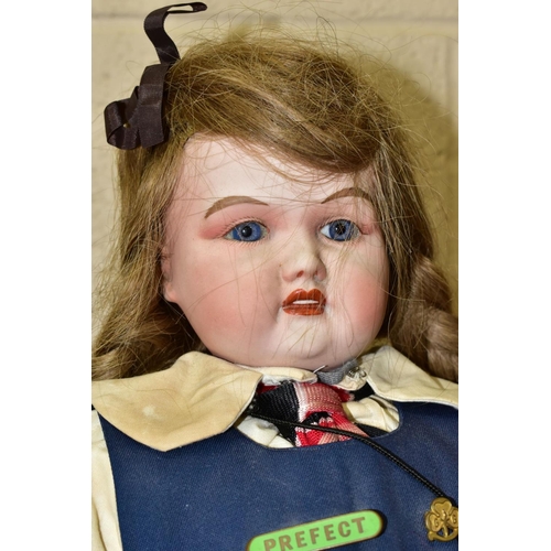 462 - A GOSS BISQUE HEAD AND SHOULDERS DOLL, shoulders marked 'Goss 32', fixed glass eyes, open mouth show... 