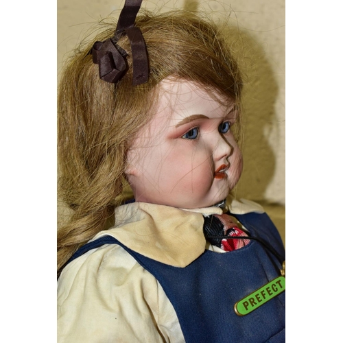 462 - A GOSS BISQUE HEAD AND SHOULDERS DOLL, shoulders marked 'Goss 32', fixed glass eyes, open mouth show... 