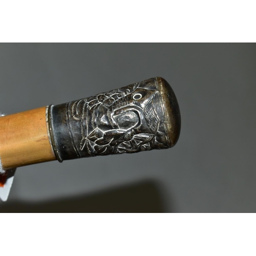 474 - A LATE 19TH CENTURY CHINESE SILVER MOUNTED MALACCA WALKING STICK, the silver repousse decorated with... 