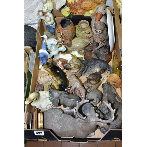 493 - TWO BOXES AND LOOSE ANIMAL AND BIRD SCULPTURES AND ORNAMENTS IN CERAMIC AND RESIN, ETC, including a ... 