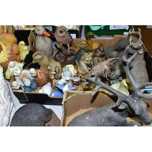 493 - TWO BOXES AND LOOSE ANIMAL AND BIRD SCULPTURES AND ORNAMENTS IN CERAMIC AND RESIN, ETC, including a ... 