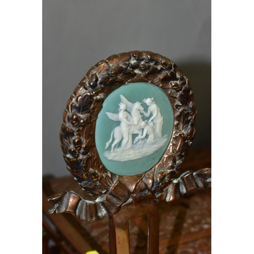 525 - A PAIR OF COPPER ART NOUVEAU FIRE DOGS, with green Jasper style plaques inset into a Laurel Wreath f... 