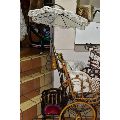 531 - A MODERN REPRODUCTION DOLLS PRAM, with integral lace parasol, complete and in fairly good condition,... 