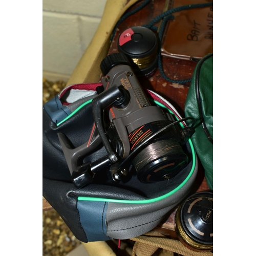 554 - THREE SPINNING FISHING REELS, comprising a Daiwa US-80X, a Silstar CX41 with two spare spools and an... 