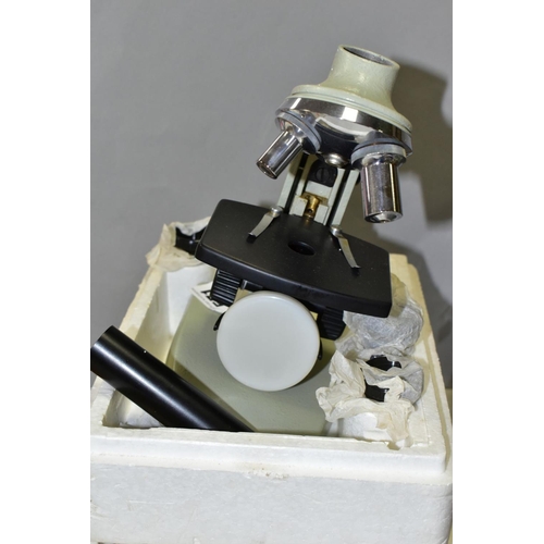 571 - A RUSSIAN MADE MONOCULAR MICROSCOPE, marked YM-301 N8807 Production de L'URSS, appears complete with... 