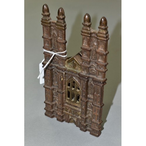 583 - A CAST IRON MONEY BOX, in the form of a twin towered Gothic Cathedral , marked bank to front, flat V... 