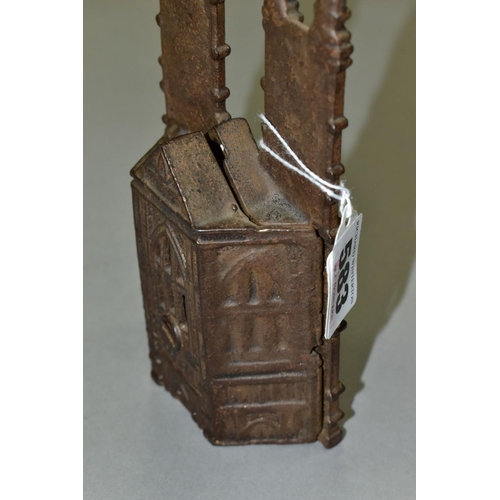 583 - A CAST IRON MONEY BOX, in the form of a twin towered Gothic Cathedral , marked bank to front, flat V... 