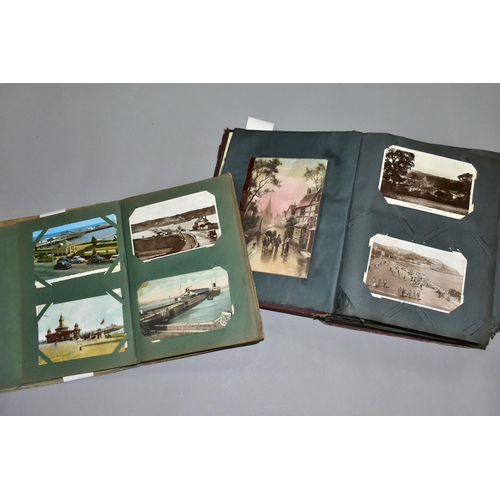 589 - POSTCARDS, two albums of postcards containing approximately 297 miscellaneous topographical vistas, ... 