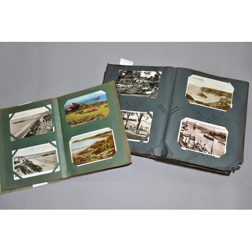 589 - POSTCARDS, two albums of postcards containing approximately 297 miscellaneous topographical vistas, ... 