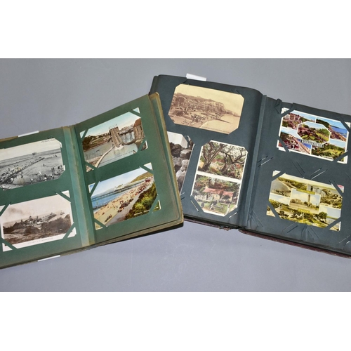 589 - POSTCARDS, two albums of postcards containing approximately 297 miscellaneous topographical vistas, ... 