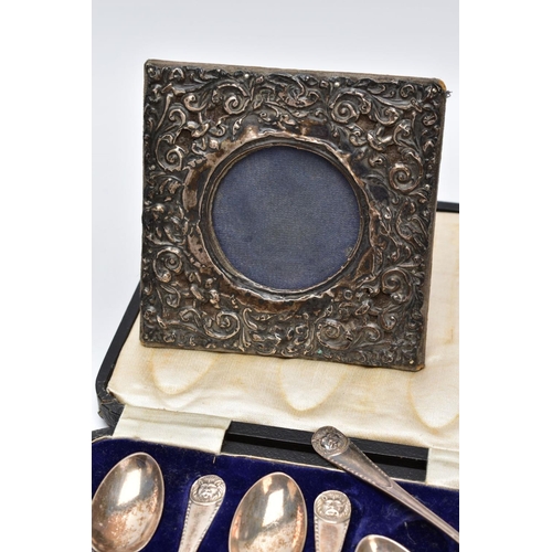 59 - TWO CASED SETS OF SILVER TEASPOONS, A SINGLE CASED TEASPOON AND A MINIATURE SILVER PHOTOFRAME, the f... 