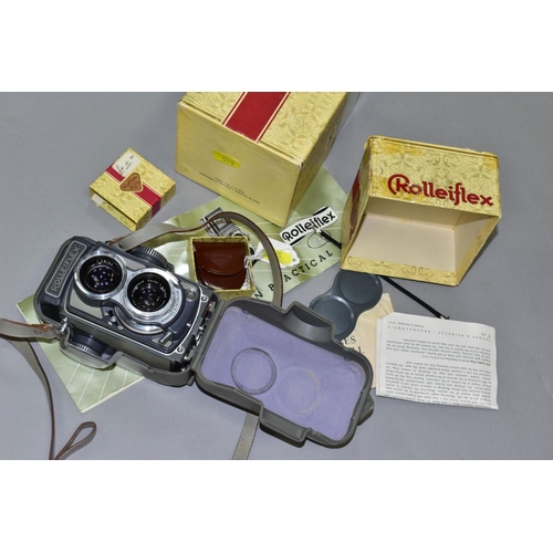 590 - A ROLLEIFLEX 'BABY ROLLE', 4cm x 4cm roll film camera in grey, fitted with Schneider Xenar 60mm f3.5... 