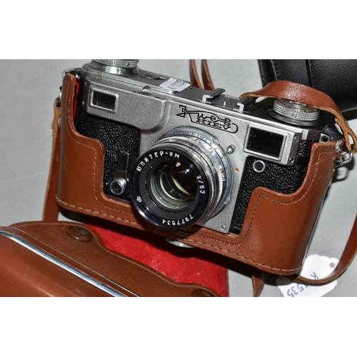 593 - A RUSSIAN KIEV RANGEFINDE CAMERA, complete with 53mm f2 interchangable  lens and leather case, toget... 