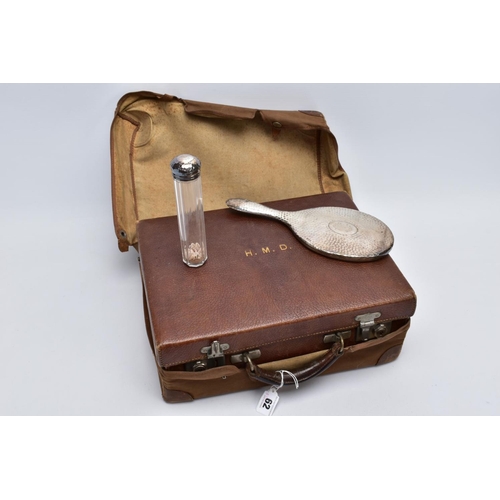 62 - A GENTLEMANS GROOMING TRAVEL CASE, a brown leather case with a brown outer push button cover, presse... 