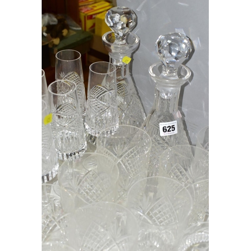 625 - A MATCHED SUITE OF CUT GLASS DRINKING GLASSES, together with a pair of conical shaped decanters, to ... 