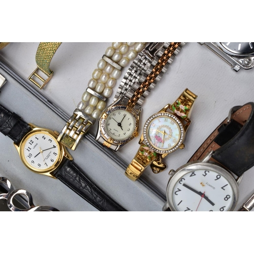 65 - A BOX OF WRISTWATCHES, of various designs, to include names such as 'Citron, Limit' etc