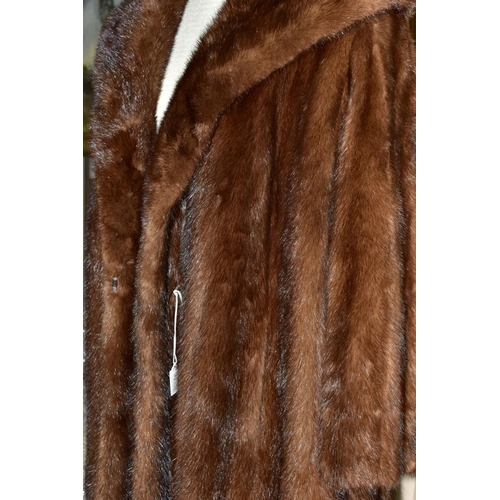 673 - A LADIES RACKHAMS OF BIRMINGHAM BROWN MUSQUASH FUR COAT, approximate UK size 16/18, short arm length... 