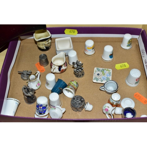 678 - THREE WOODEN DISPLAY SHELVES OF METAL AND CERAMIC THIMBLES AND SOUVENIR SPOONS, together with a smal... 