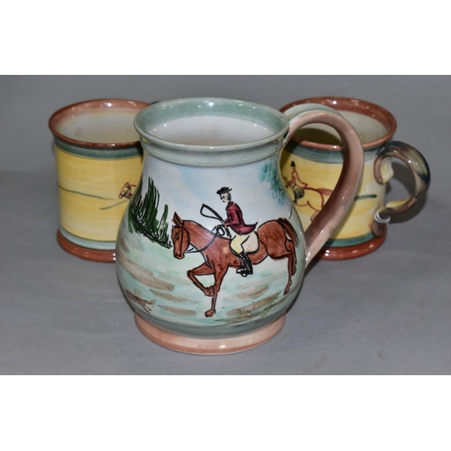 682 - A PAIR OF GLYN COLLEDGE OF DENBY HAND PAINTED HUNTING MUGS AND A BALUSTER SHAPED TANKARD, similarly ... 