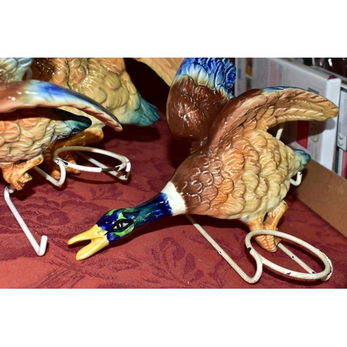 701 - A GRADUATED SET OF THREE FALCON WARE FLYING DUCK WALL PLAQUES, the largest model No 1360, the middle... 