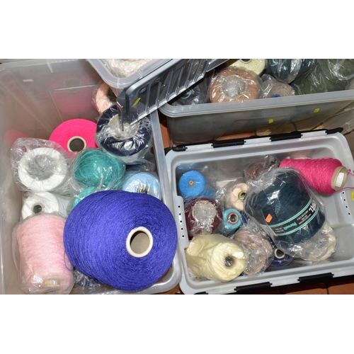 708 - SIX PLASTIC BOXES OF CONES OF ASSORTED KNITTING MACHINE WOOL/ACRYLIC, wool/nylon and various synthet... 