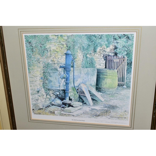 710 - FRAMED PRINTS, comprising a signed limited edition Eric Sturgeon rural village scene, framed, approx... 