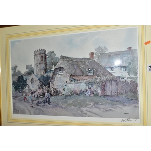 710 - FRAMED PRINTS, comprising a signed limited edition Eric Sturgeon rural village scene, framed, approx... 