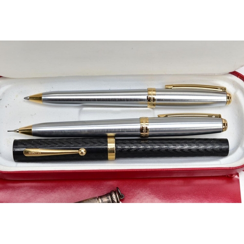 75 - A BOX OF PENS AND RETRACTABLE PENCILS, to include a variety of ball point, fountain pens and retract... 