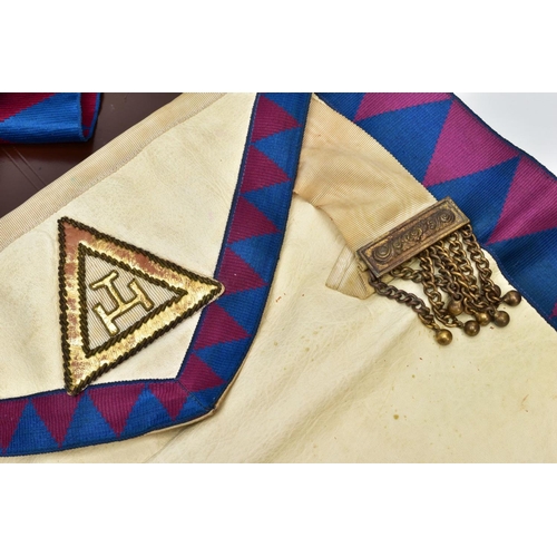 76 - TWO CASES OF MASONIC REGALIA, to include Masonic aprons, one with a blue, purple and white design th... 