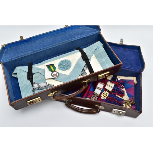 76 - TWO CASES OF MASONIC REGALIA, to include Masonic aprons, one with a blue, purple and white design th... 