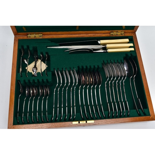 87 - A COMPLETE CANTEEN OF CUTLERY, a light wooden canteen containing a forty eight piece set includes pl... 