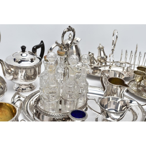 93 - A BOX OF METALWARE. To include a white metal and glass six-piece cruet set, a 'Walker & Hall' white ... 