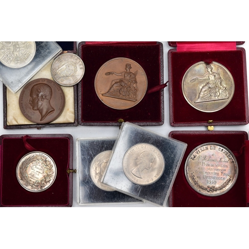 123 - A SMALL PLASTIC BOX OF MEDALS AND COMMEMORATIVES, to include three white metal medals to Norbet Weth... 