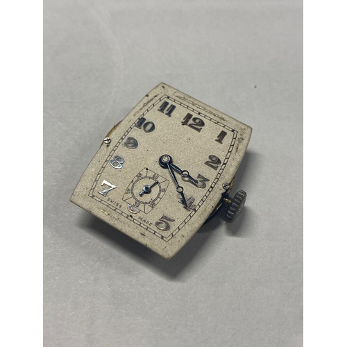 53 - A GENTS WRISTWATCH, curved rectangular cream dial, Arabic numerals, with a seconds subsidiary dial a... 