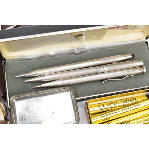 100 - A TRAY CONTAINING TWO BOXED 14CT GOLD FILLED BALLPOINT PENS, a boxed Sterling Silver Cross propellin... 