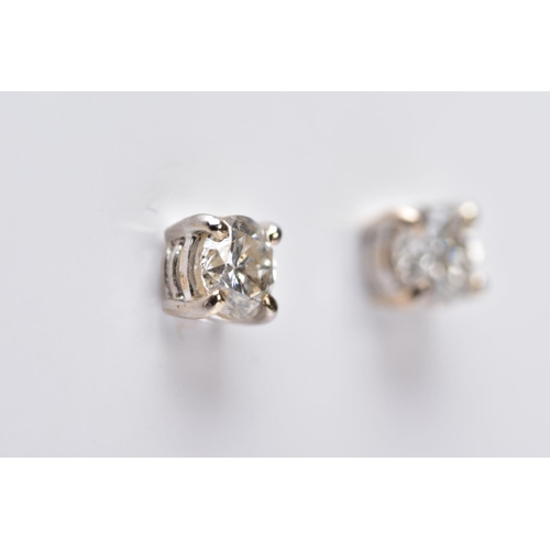 119 - A MODERN PAIR OF 18CT WHITE GOLD DIAMOND STUD EARRINGS, estimated total modern round brilliant cut w... 