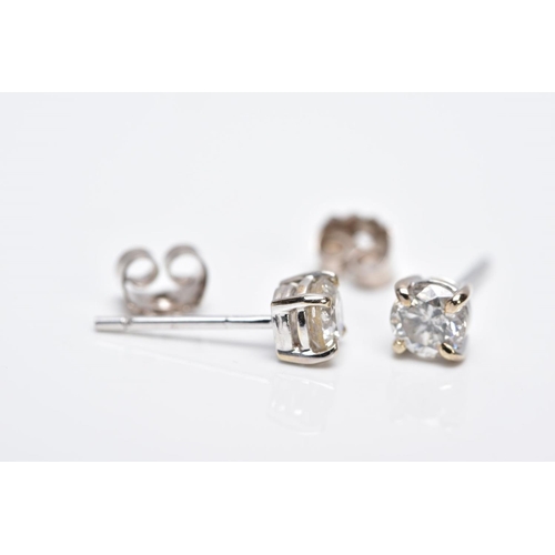 119 - A MODERN PAIR OF 18CT WHITE GOLD DIAMOND STUD EARRINGS, estimated total modern round brilliant cut w... 