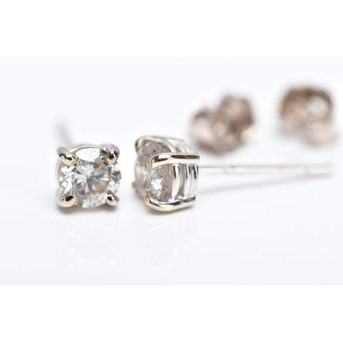 119 - A MODERN PAIR OF 18CT WHITE GOLD DIAMOND STUD EARRINGS, estimated total modern round brilliant cut w... 