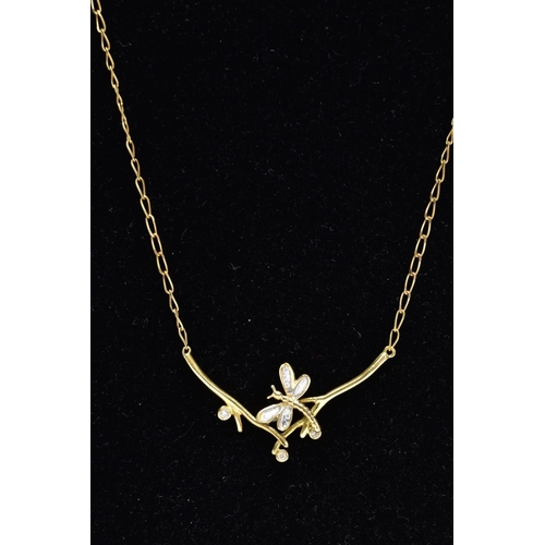 120 - A MODERN DIAMOND PENDANT STYLED AS A DRAGONFLY BETWEEN BRANCHES, fitted in a fixed position to a lon... 