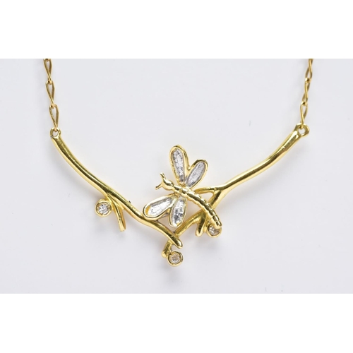 120 - A MODERN DIAMOND PENDANT STYLED AS A DRAGONFLY BETWEEN BRANCHES, fitted in a fixed position to a lon... 