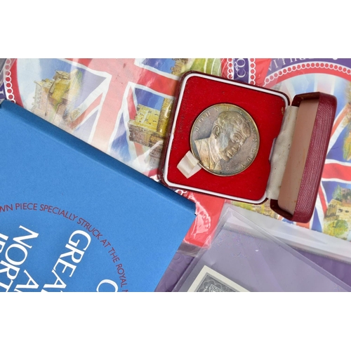 125 - A SMALL BOX OF UK COINAGE, to include a silver gilt Jubilee 1977 medal (stained), a J F Kennedy 1951... 