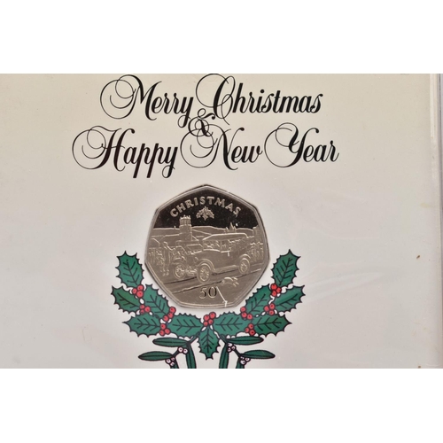 129 - ISLE OF MAN CHRISTMAS FIFTY PENCE COMMEMORATIVE COINS, The Worlds First of It's Kind, to include six... 