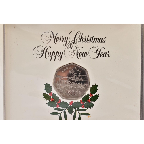 129 - ISLE OF MAN CHRISTMAS FIFTY PENCE COMMEMORATIVE COINS, The Worlds First of It's Kind, to include six... 