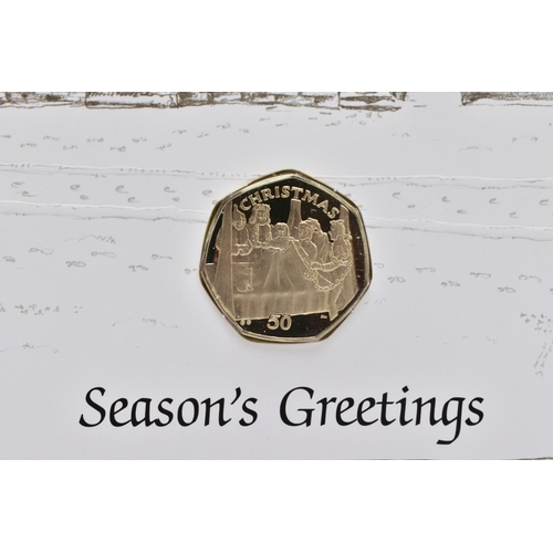 133 - CHRISTMAS FIFTY PENCE POBJOY ISLE OF MAN, to include 2001 and 2002 Victorian letter box, manger scen... 