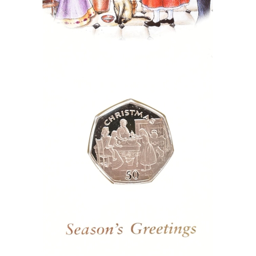 137 - POBJOY ISLE OF MAN CHRISTMAS FIFTY PENCE COINS, to include Newspaper Seller 1992 on greeting card, 1... 