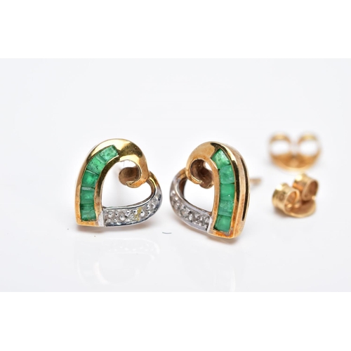 14 - A PAIR OF 9CT GOLD EMERALD AND DIAMOND EARRINGS, each designed as an openwork heart to one side set ... 