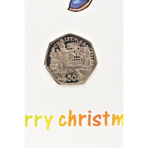 140 - EIGHT CHRISTMAS 50P COINS ON CARDS, DIAMOND FININSH BY POBJOB FOR THE ISLE OF MAN, 1988 B.S.A. Motor... 